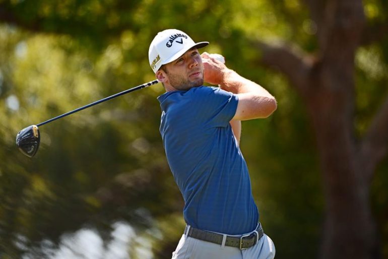 PALM HARBOR, FLORIDA - MARCH 20: Sam Burns of the United States plays his shot from the first tee during the final round of the Valspar Championship on the Copperhead Course at Innisbrook Resort and Golf Club on March 20, 2022 in Palm Harbor, Florida. (Photo by Julio Aguilar/Getty Images)