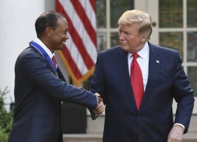 US President Donald Trump and US golfer Tiger Woods Photo by SAUL LOEB / AFP